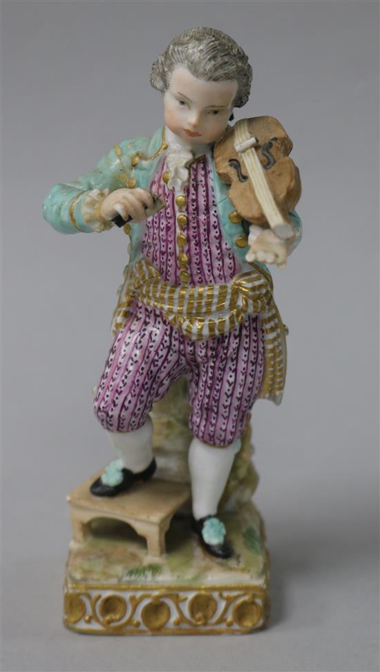 A Meissen figure of a boy violinist